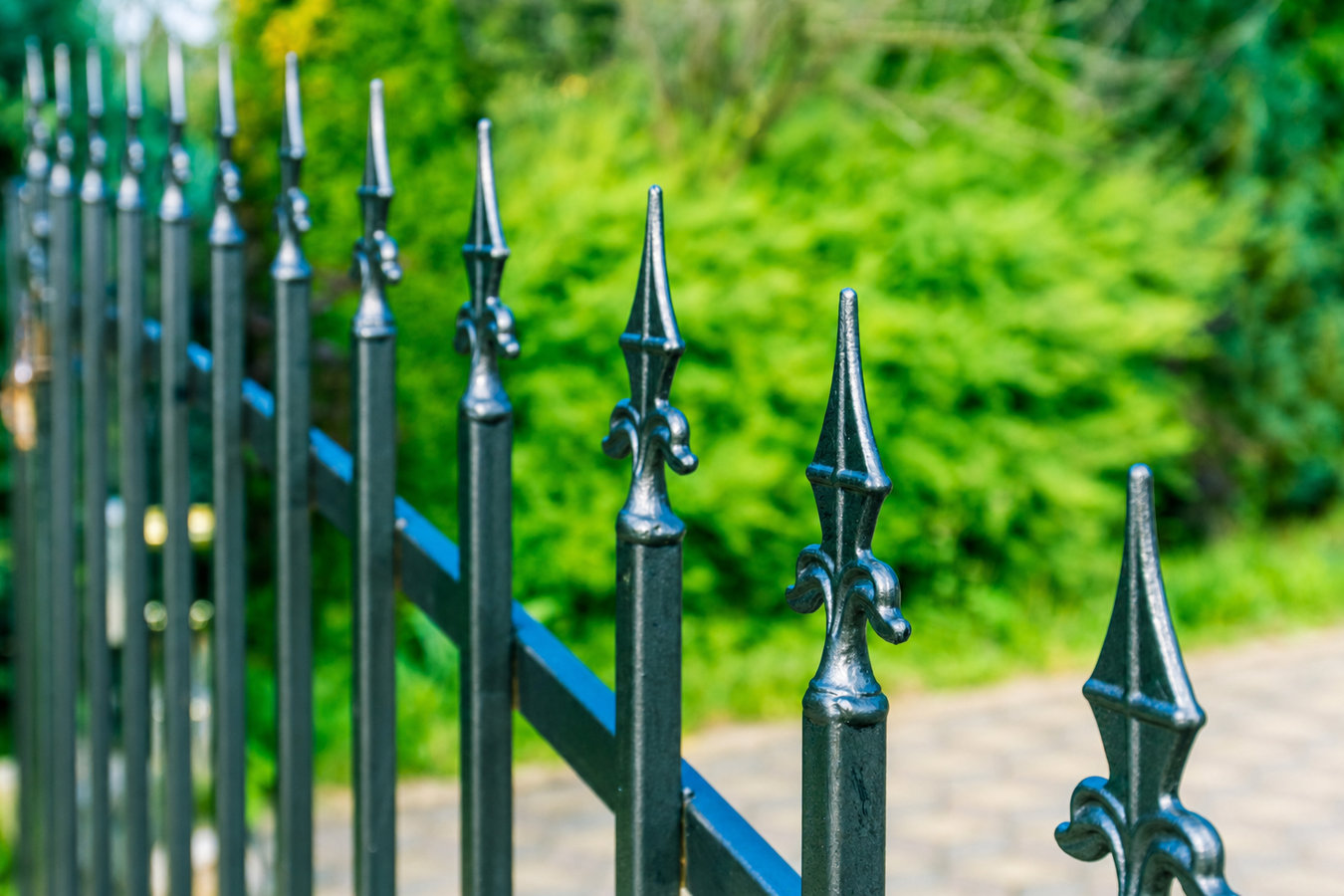 Ornamental iron fence installation